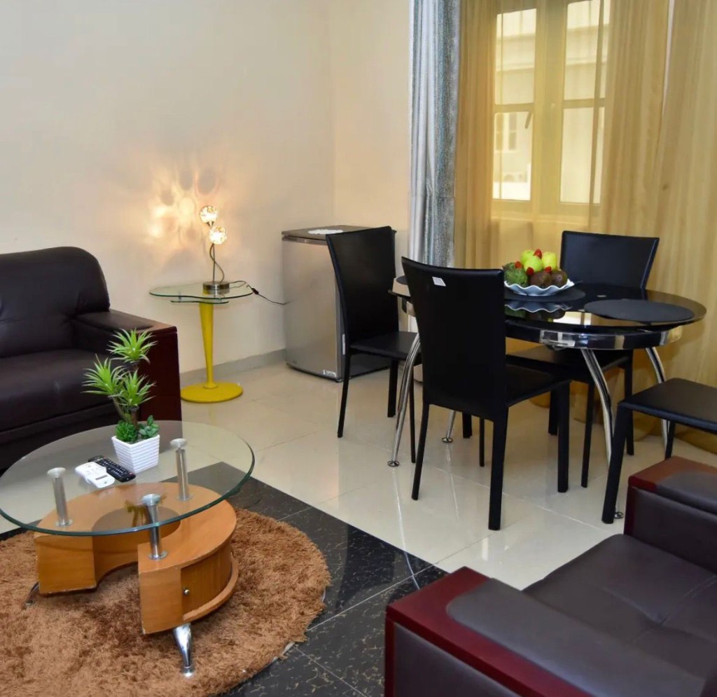 Suite living and dining area with sofa and table